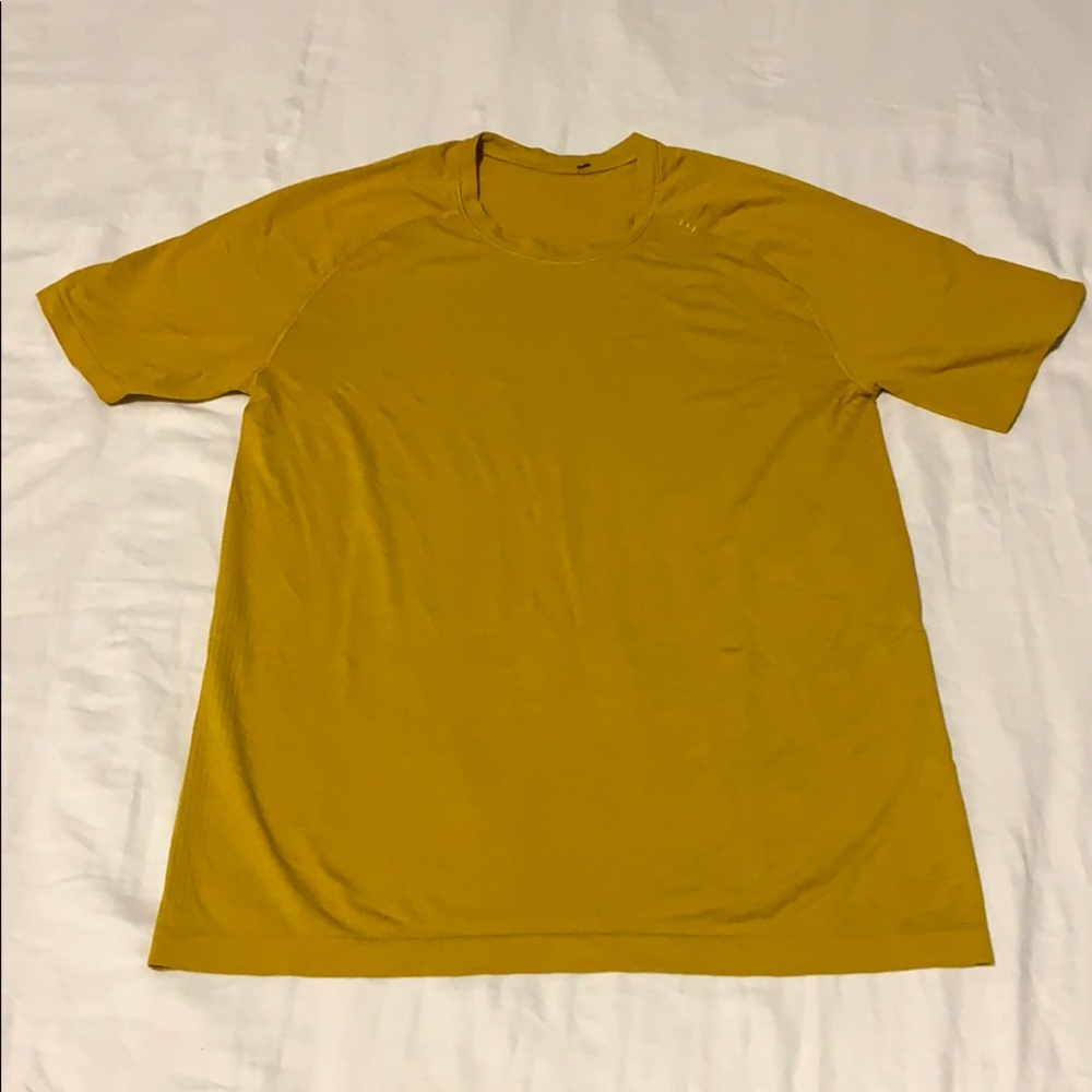 Medium men’s Lululemon gold shirt